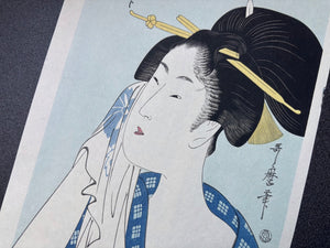 - Minami-eki Ha-jirushi (Woman Relaxing after Her Bath)-